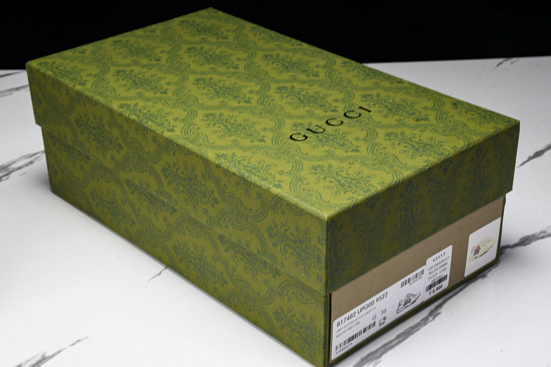 G*u*i sneakers