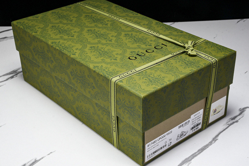 G*u*i sneakers